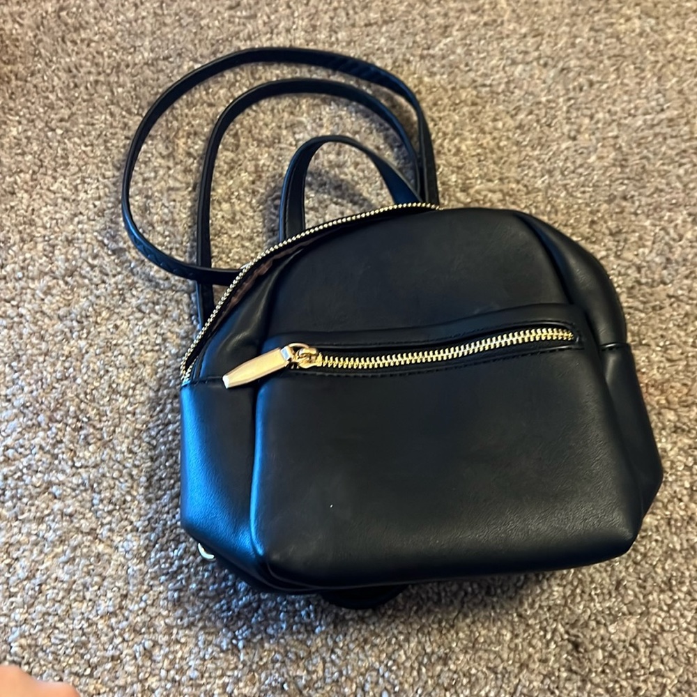 This is a really cute book bag purse